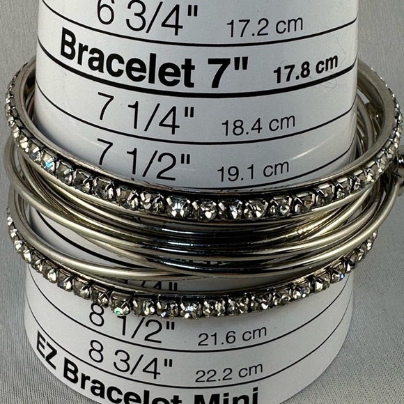Set of eight silver tone bangles with clear rhinestones - Picture 3 of 4
